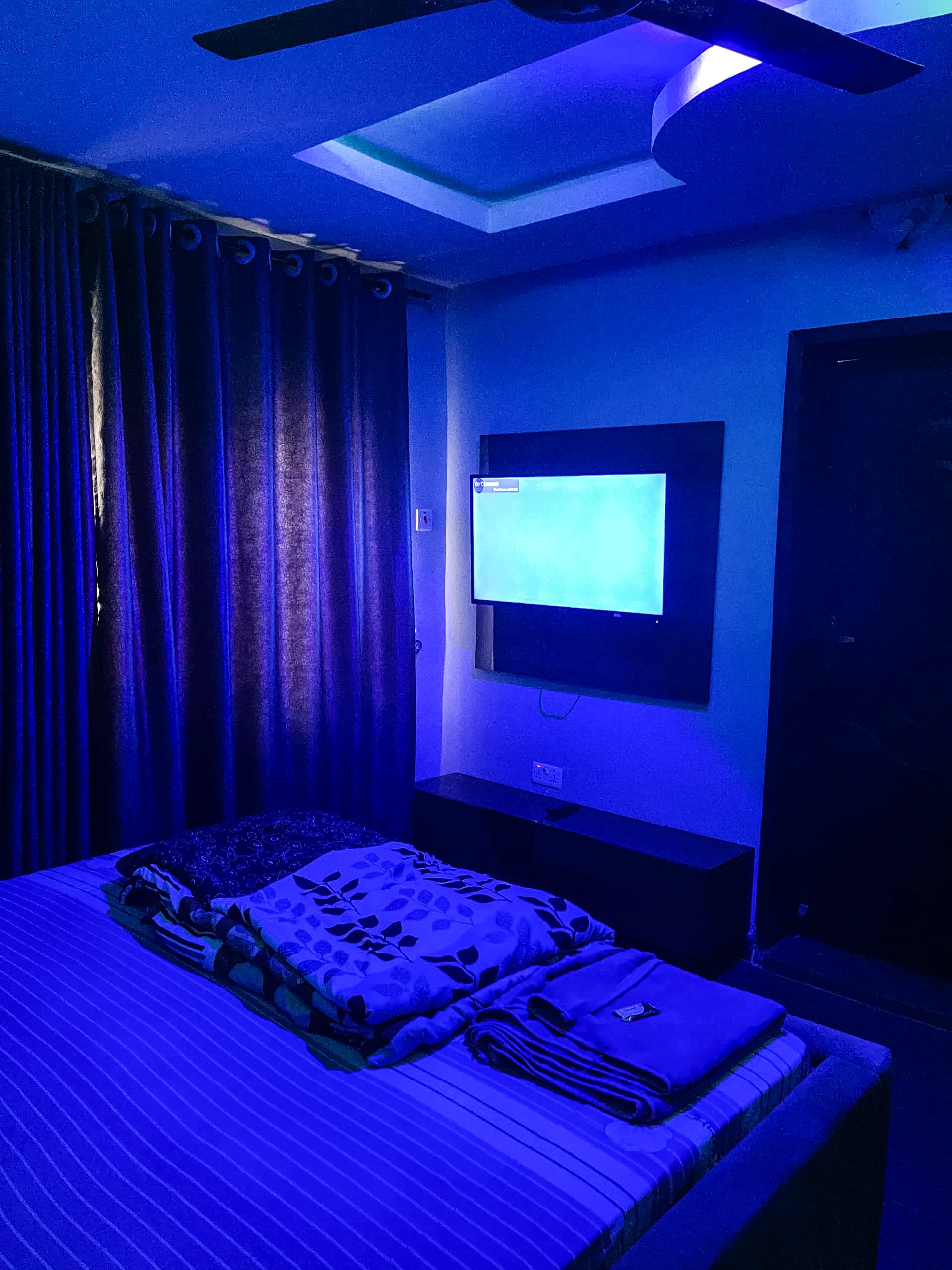Executive bedroom layout with styled furnishings and clean linens