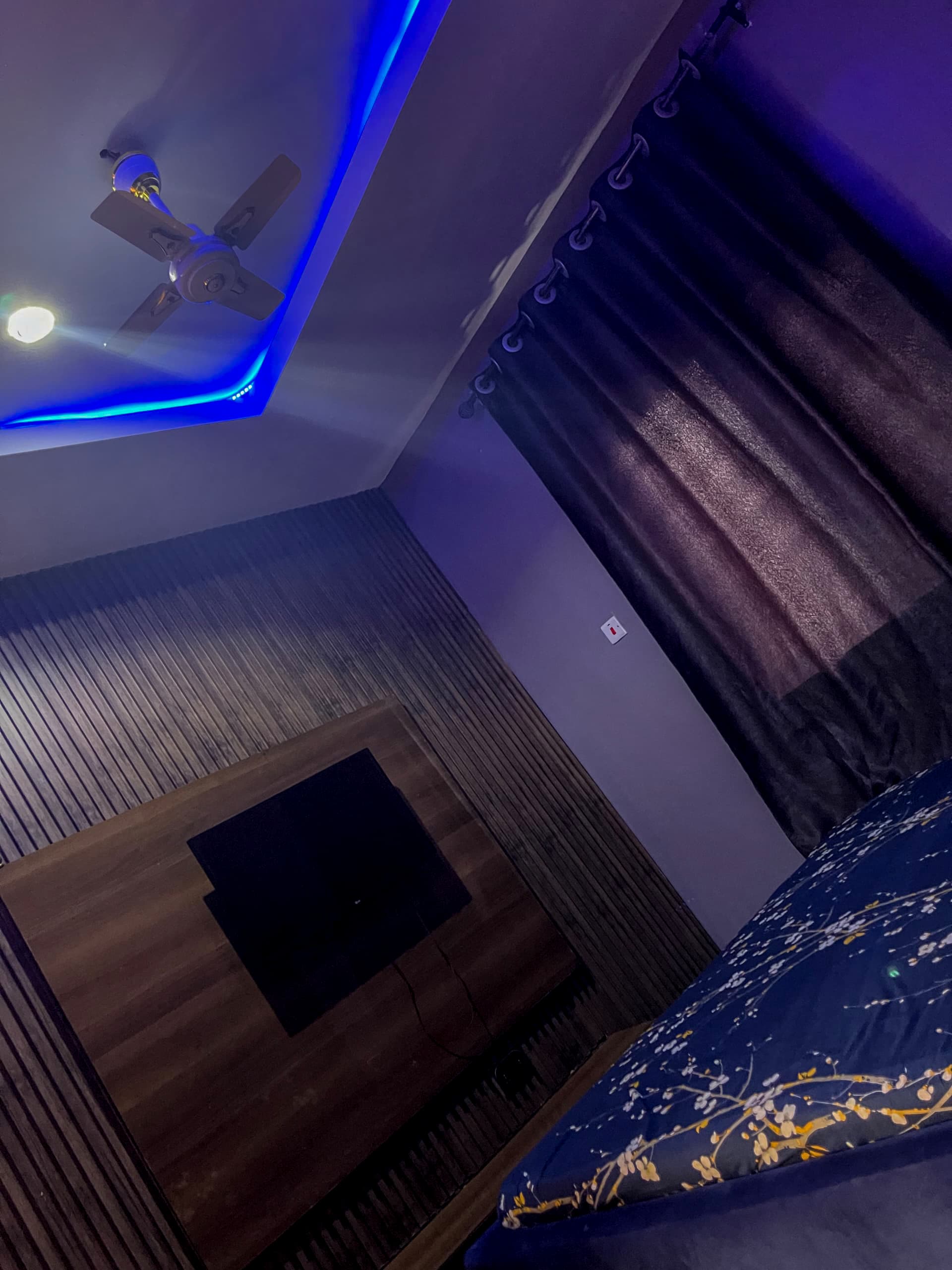 Refined hotel suite interior with ambient bedside lighting